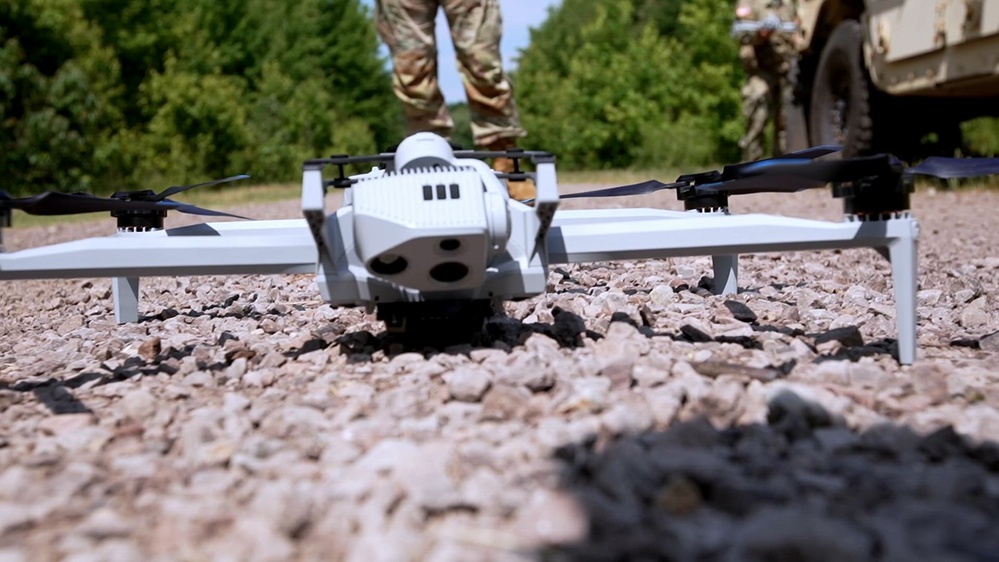 Small unmanned aircraft system positioned on gravel during counter-UAS field training