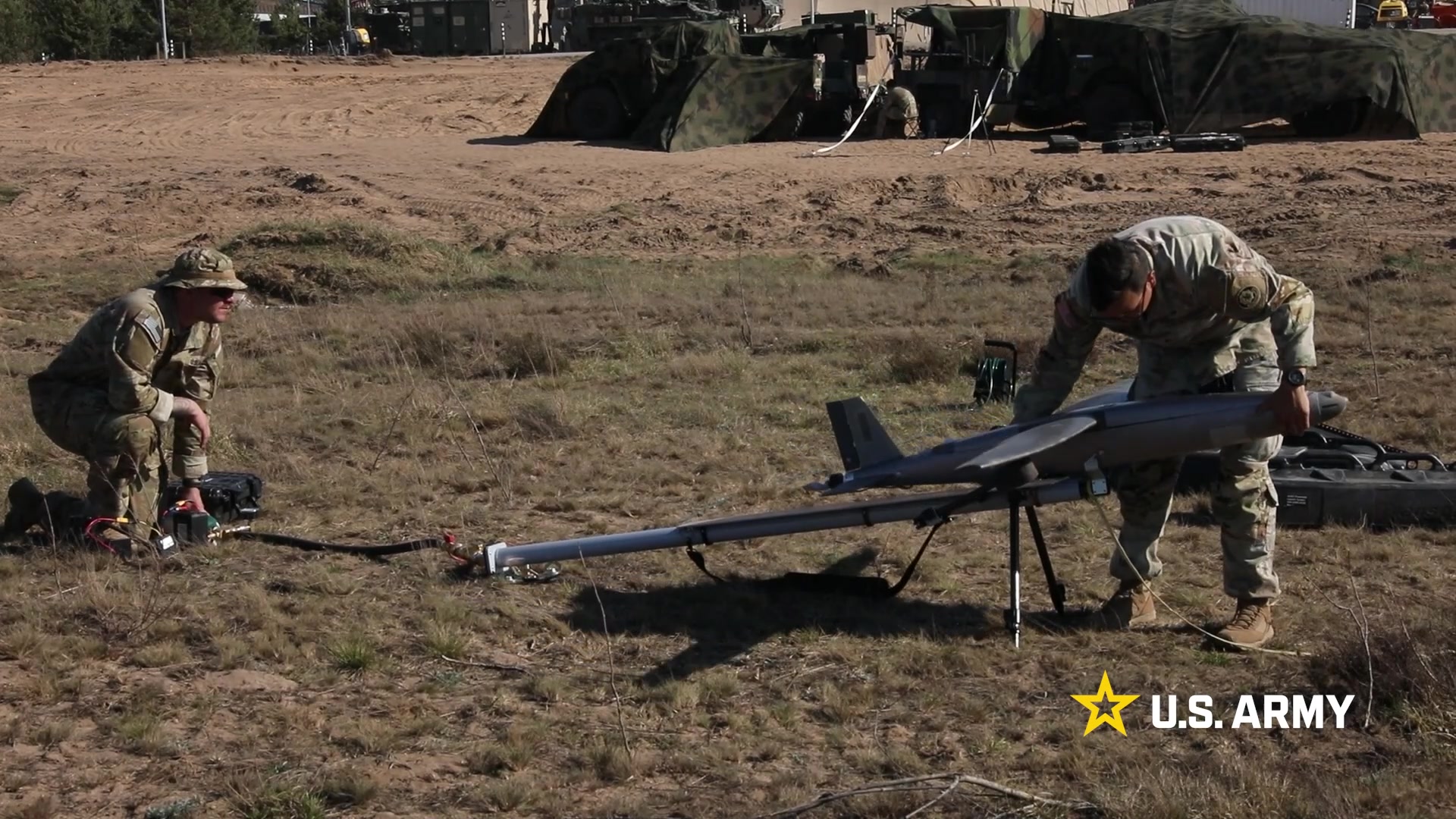Crews servicing a counter-drone system in the field